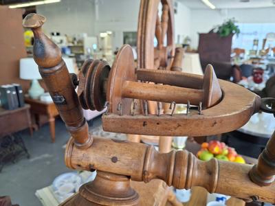 antique spinning wheel close up